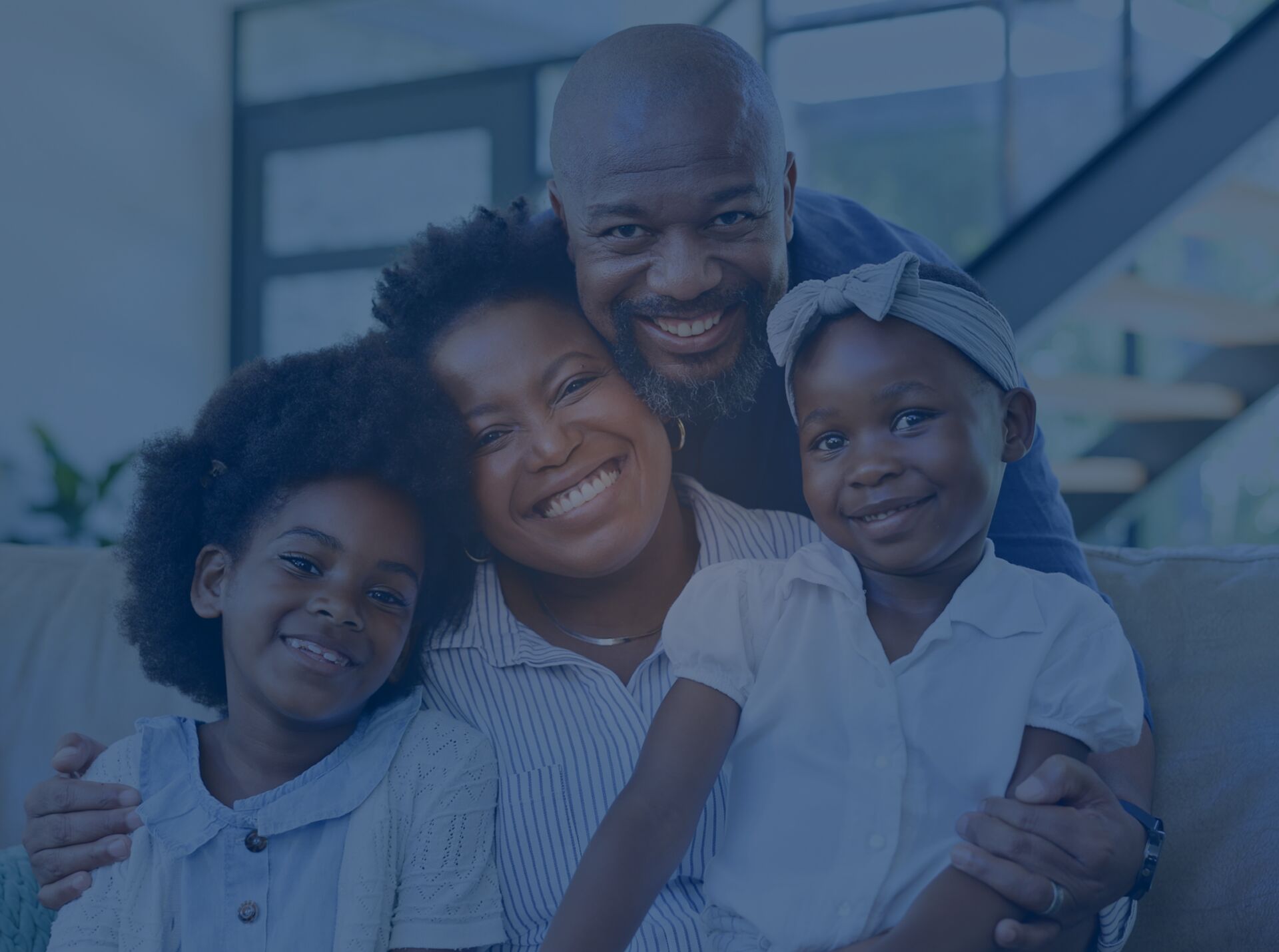 A South African family sharing a joyful moment at home